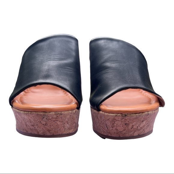 Madden Girl
Nuriel Cork Wedges  
Black
4-1/2" Cork Wedge Heel - Picture 8 of 16